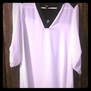 Tunic length black and white blouse